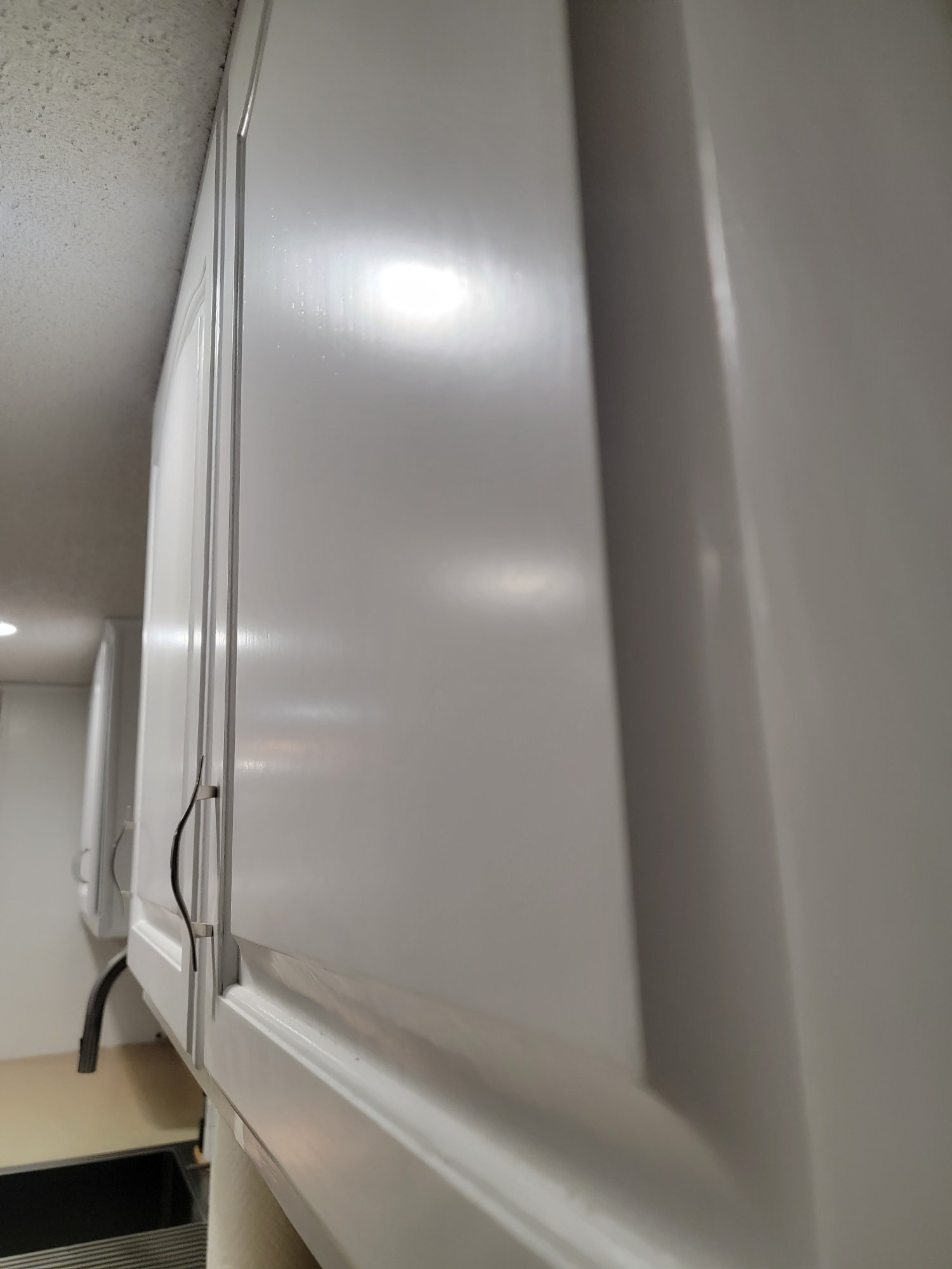 Cabinet close-up showing smooth 2K finish